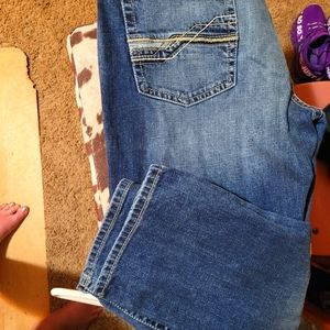 Men's Ariat, low rise, slim fit jeans.